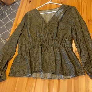 Slightly cropped green/gray blouse